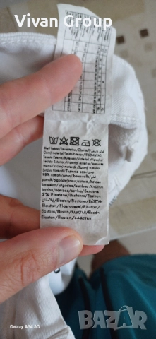 Бели дамски дънки W38, снимка 9 - Дънки - 51547382