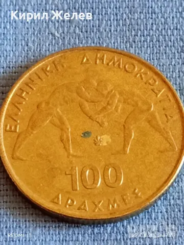 Монета 100 драхми 1999г. Гърция 45 Световно първенство по борба Атина 26630, снимка 3 - Нумизматика и бонистика - 49991875