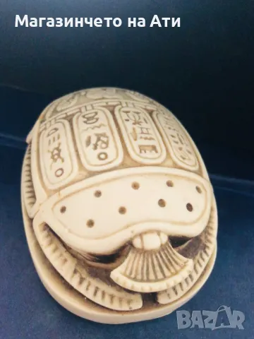 Статуя скарабей