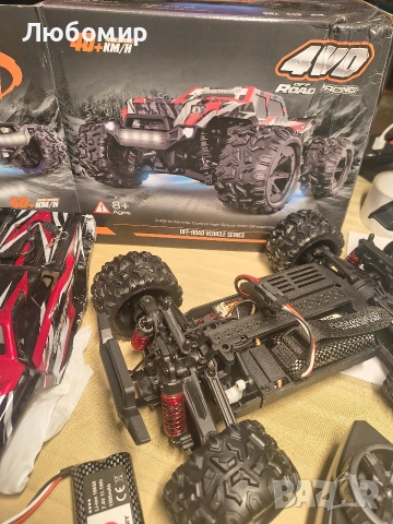 Кола с дистанционно управление 40 км/ч, мащаб 1:18 за офроуд с радиоуправляеми двигатели , снимка 2 - Кукли - 53353157