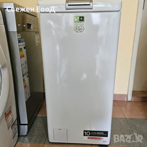 пералня с горно зареждане AEG - 7 кг.с функция пара, снимка 4 - Перални - 49752917