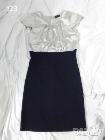 Интересна маркова рокля от сатен и немачкащ се еластант