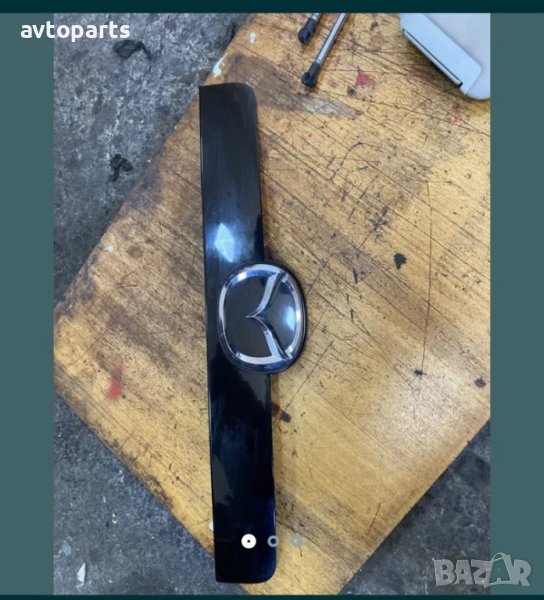 Mazda CX-7 2010година Лайсна багажник с емблема, снимка 1