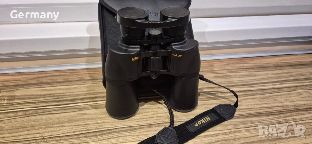 бинокъл nikon 10x50