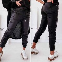 СТРАХОТЕН черен кожен панталон със странични декоративни ципове, снимка 1 - Клинове - 30065726