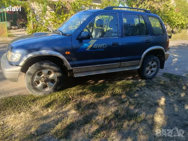 Киа спортидж 2.0 , снимка 2 - Автомобили и джипове - 56344237