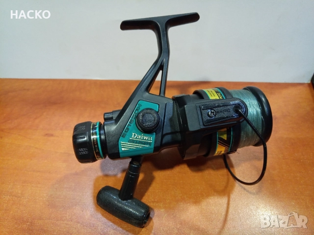 Рибарска Макара Daiwa eg 1650 H graffiti Made in Tailand, снимка 9 - Макари - 52416222