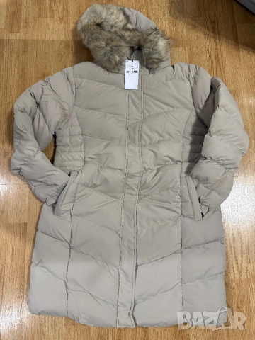 Дълго капитонирано зимно яке с "V-образни" шевове