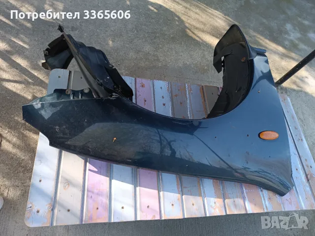 Десен калник+подкалник Мазда 323F