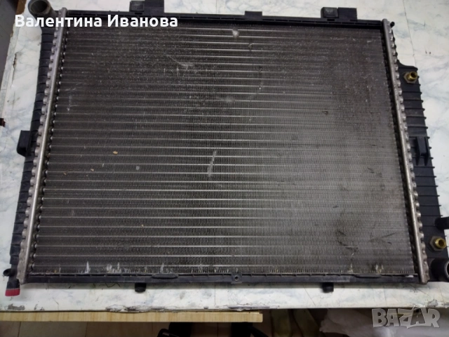 Радиатор Mercedes E210