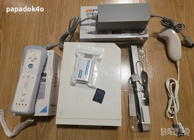 Пълен комплект Wii + 21 игри и аксесоари 