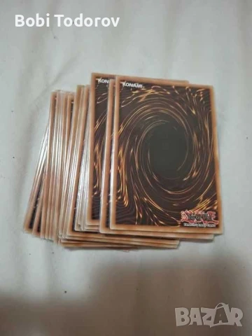 Оригинални карти yu-gi-oh с протектори 82 на брой., снимка 4 - Карти за игра - 51316934