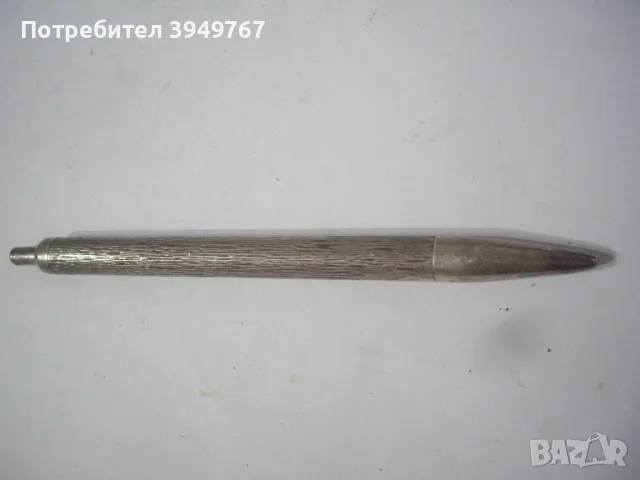 Стара сребърна химикалка.