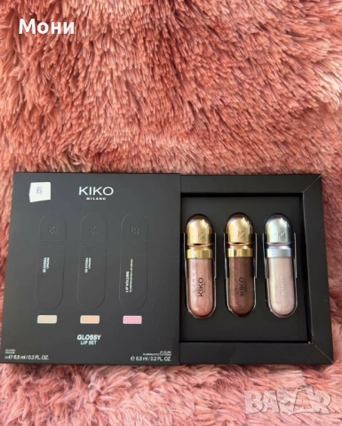 Това е козметичният комплект Glossy Lip Set на марката KIKO Milano, който включва селекция от хидрат