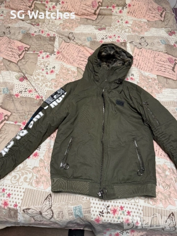 Късо зимно яке , снимка 2 - Якета - 53380847