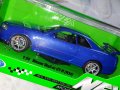 Nissan SkyLine GT R R34 Lamborghini Urus 1.24 Welly, снимка 16