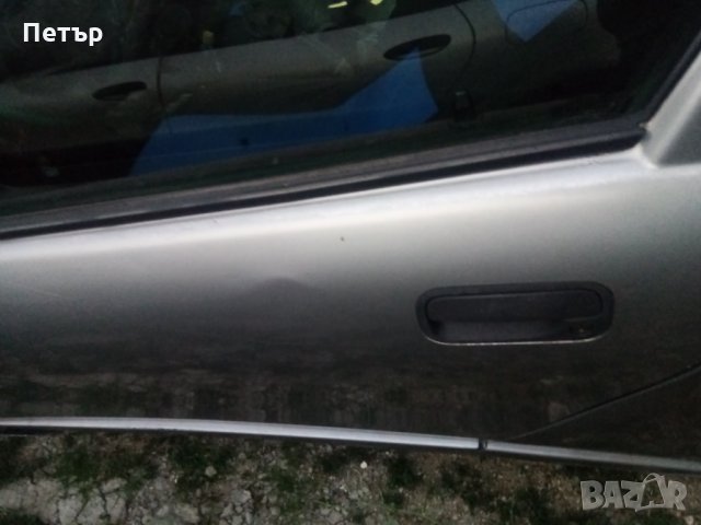 Лява врата Опел тигра, снимка 2 - Части - 29597705