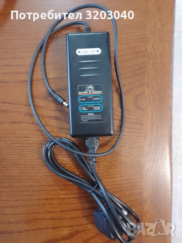 Зарядно устройство за колело 48 волта, снимка 2 - Части за велосипеди - 51252538