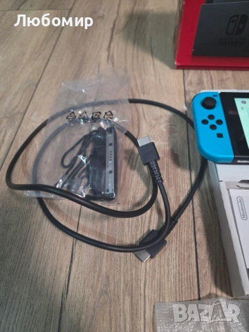 Конзола Nintendo switch + калъф, снимка 8 - Nintendo конзоли - 54295789