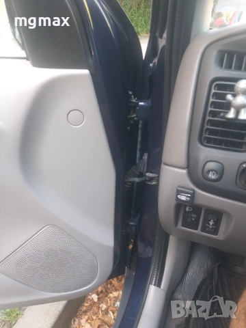 Mazda Tribute 2,0l 4x4, снимка 13 - Автомобили и джипове - 51584608