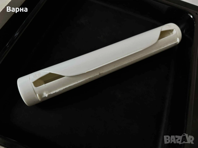 Диспенсър за фолио на ролка