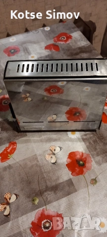 Тостер за филийки, никелиран корпус, и кабел.