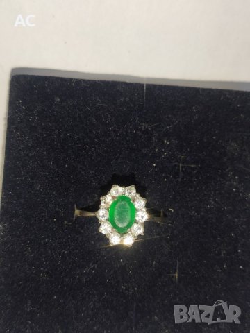 Сребърен пръстен с зелен камък