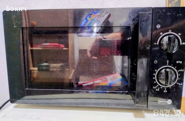Повредена микровълнова фурна SWITCH ON, 650 W, 17 л, за ремонт , снимка 3 - Печки, фурни - 51041502