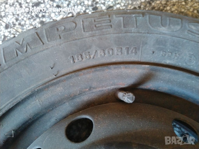 Метална джанта 4 х 100 с гума 185 / 60 R 14 , снимка 3 - Гуми и джанти - 36516137