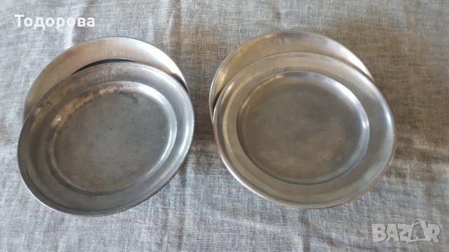 Комплект метални чинии от началото на миналия век