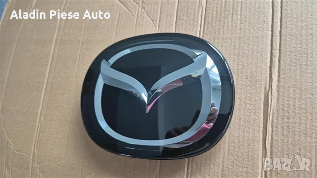Емблема за преден радар Mazda CX3 CX-3 година 2016 2017 2018 2019 2020 2021 2022 код DD2F517300 