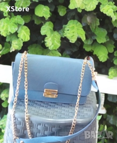 Малка дамска кожена чанта за през рамо. Предлага се в 8 цвята