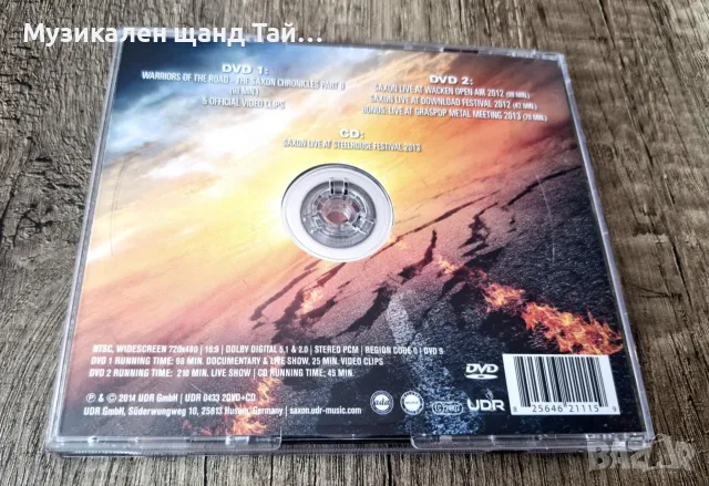 Компакт Дискове - Рок - Метъл: Saxon – Warriors Of The Road - Part II - 2 DVD + 1 CD, снимка 2 - CD дискове - 56181401