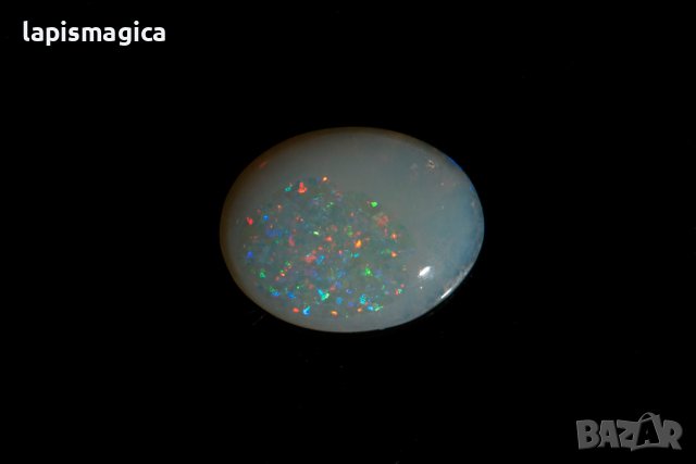 Австралийски кристален опал 0.98ct овален кабошон, снимка 1 - Други - 42909337