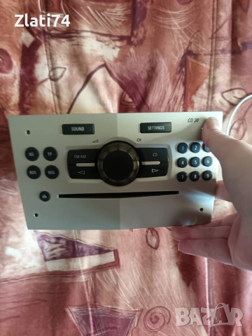 Оригинален CD PLAYER за OPEL CORSA D 1.2 2008, снимка 6 - Аксесоари и консумативи - 52790121