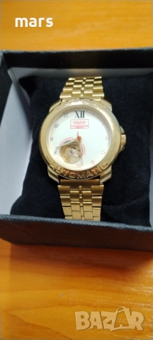 Bulova Ecology United Colors of Benetton By Bulova Automatic Open Heart BN596