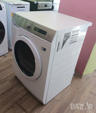 Кондензна сушилня с термопомпа  AEG  ABSOLUTE CARE SYSTEM - 8 кг, снимка 2 - Сушилни - 53799598
