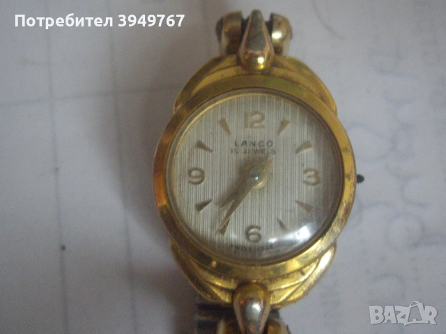 Стар дамски  позлатен часовник.