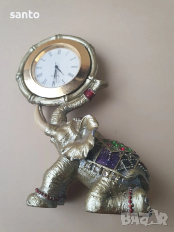 Бронзово слонче часовник.