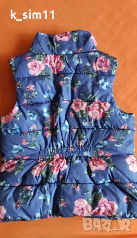 Син елек на цветя, грейка с подплата на точки на Next за 7-8 г., снимка 2 - Детски якета и елеци - 52195117