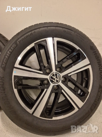 Чисто нов комплект летни гуми 215 55 R17 98H на Алуминиеви джанти за VW Caddy Touran , снимка 2 - Гуми и джанти - 54054820