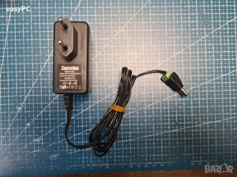 Оригинален захранващ адаптер TechniSat XKD-C2300NHS9.0 9V 2.3A , снимка 1