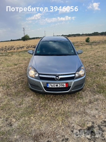 Опел Астра 1,9 6ск Навигация , снимка 6 - Автомобили и джипове - 52887975
