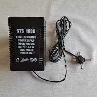 Универсален адаптер STS-1000/ 3-12 V ,1000 mA., снимка 1 - Друга електроника - 42351796