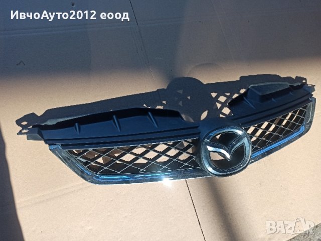 решетка с емблемата предна C235 50 711 mazda 5 оригинална 05-10г