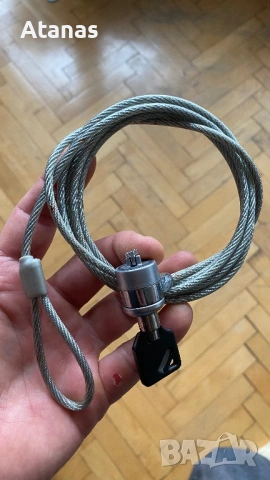 Метален защитен кабел с ключ – вид заключващо устройство (често наричано „cable lock“)