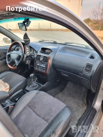 Mitsibishi Carisma, снимка 11 - Автомобили и джипове - 54252303