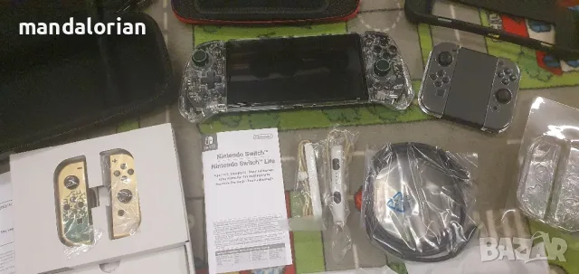 Nintendo switch Oled Zelda с гаранция и 6 контролера special edition , снимка 2 - Nintendo конзоли - 48706429
