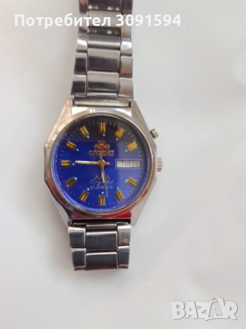  Механичен  часовник Ориент  почистен работи перфектно кристално стъкло 