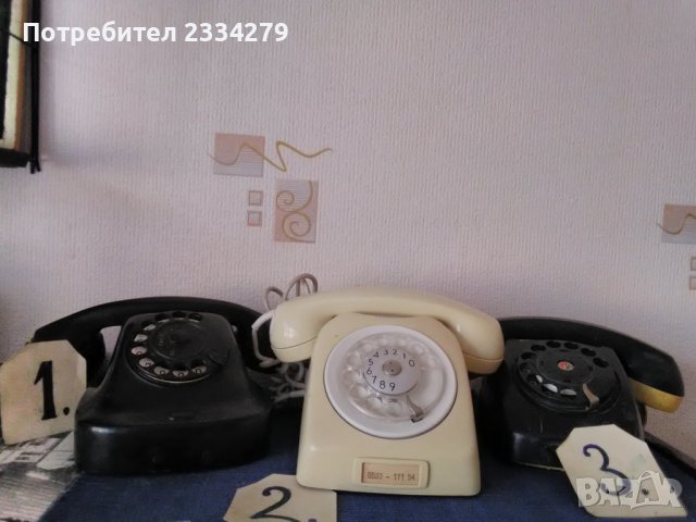 Стари телефони със шайби от 70-те години.